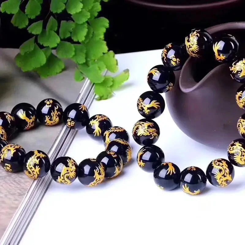 Artisan d'Asie Bracelets Malas Bracelet mala en pierre d'agate noire motif dragon