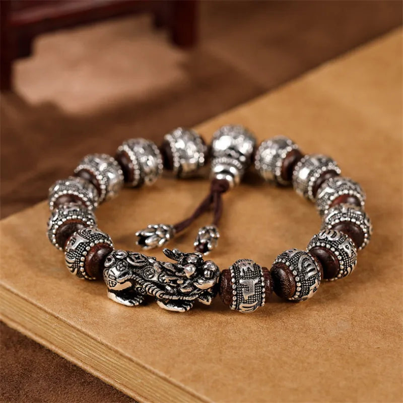 Artisan d'Asie Bracelets Malas Bracelet Mala Pixiu en Bois de Santal et Argent Pur 990