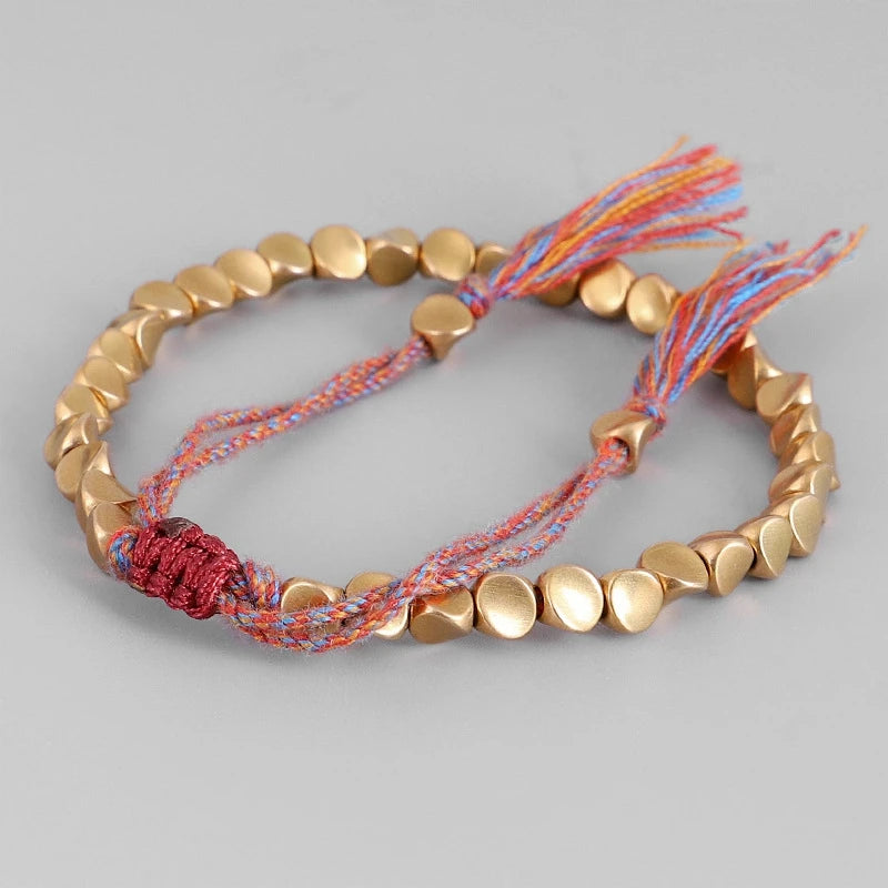 Artisan d'Asie Bracelets Tressés Tibétains Bracelet tibétain tressé à la main avec des perles de cuivre tibétaines