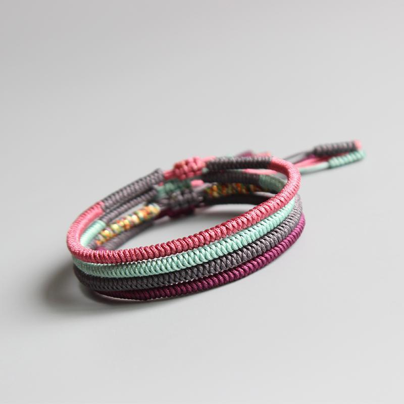 Artisan d'Asie Bracelets Tressés Tibétains Lot des 4 bracelets Bracelet Tressé Bouddhiste Tibétain - Nœud Coulissant Porte Bonheur (Rose / Vert Menthe / Gris / Violet)