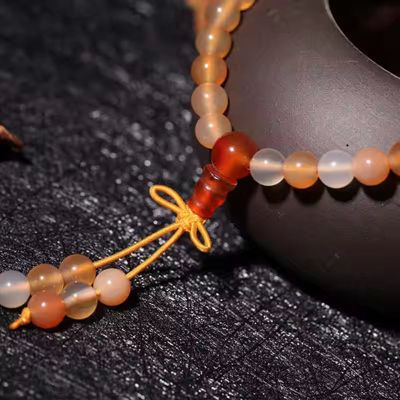 Artisan d'Asie Colliers Malas Collier mala en pierre d'agate orange et blanche