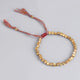 Bracelet tibétain tressé à la main avec des perles de cuivre tibétaines Bracelets Tressés Tibétains Artisan d'Asie