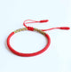 Bracelet tibétain tressé à la main rouge et or Bracelets Tressés Tibétains Artisan d'Asie