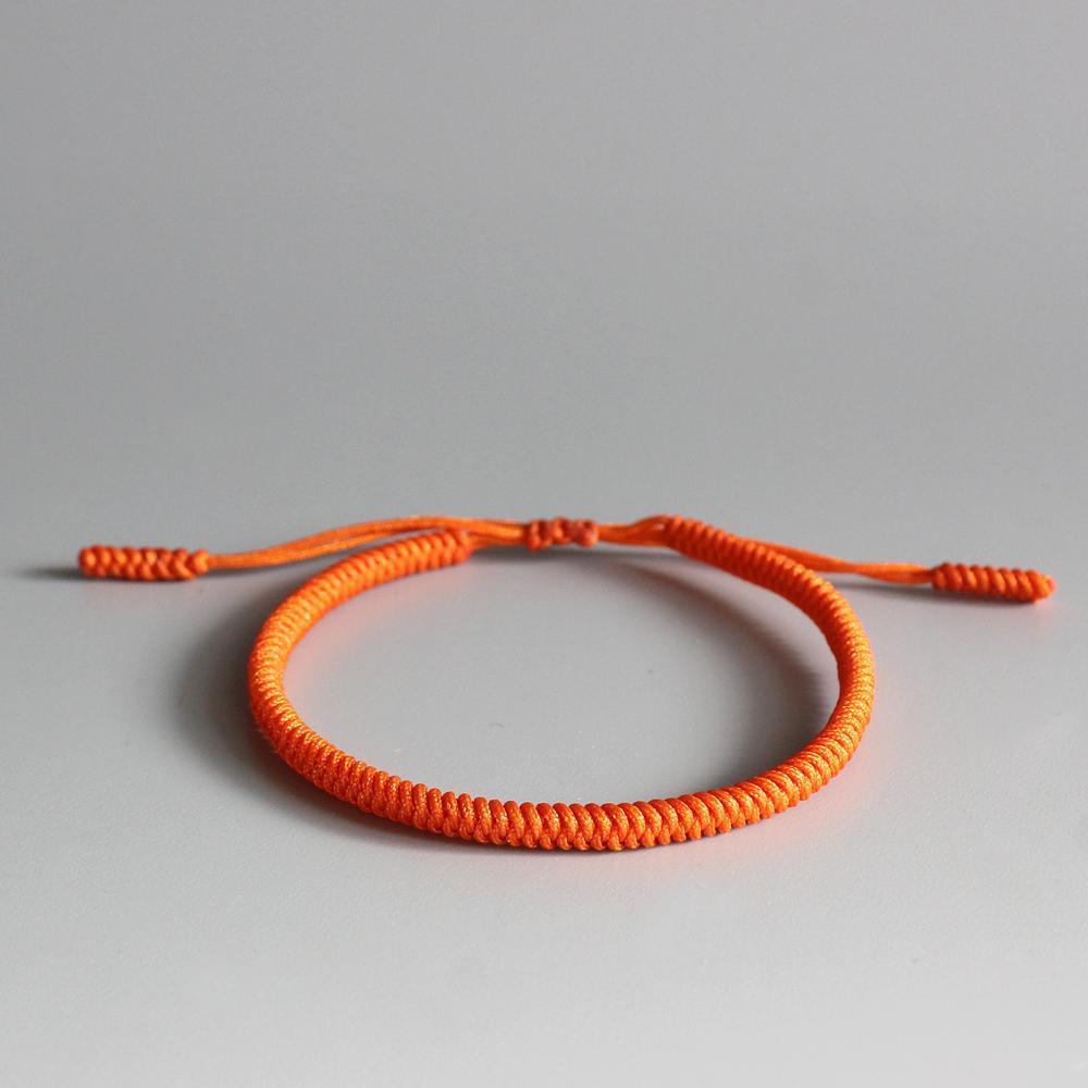 Bracelet tressé tibétain orange Bracelets Tressés Tibétains Artisan d'Asie 
