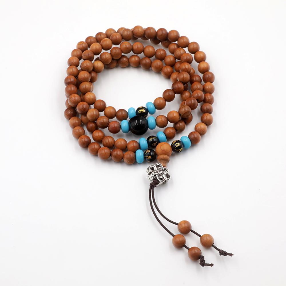 Mala necklace in sandalwood, obsidian stone and turquoise